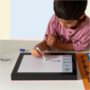 Kid playing the coding board game and practicing conditions